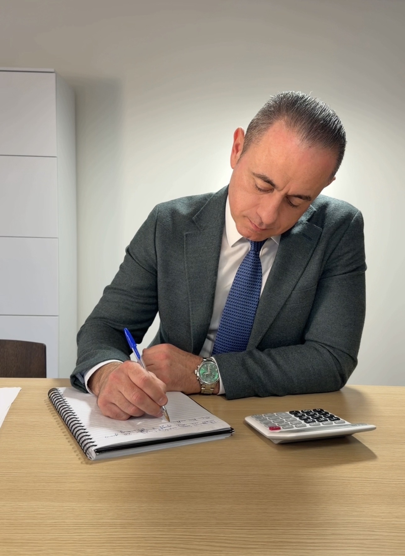 Paul Jannece working at a desk